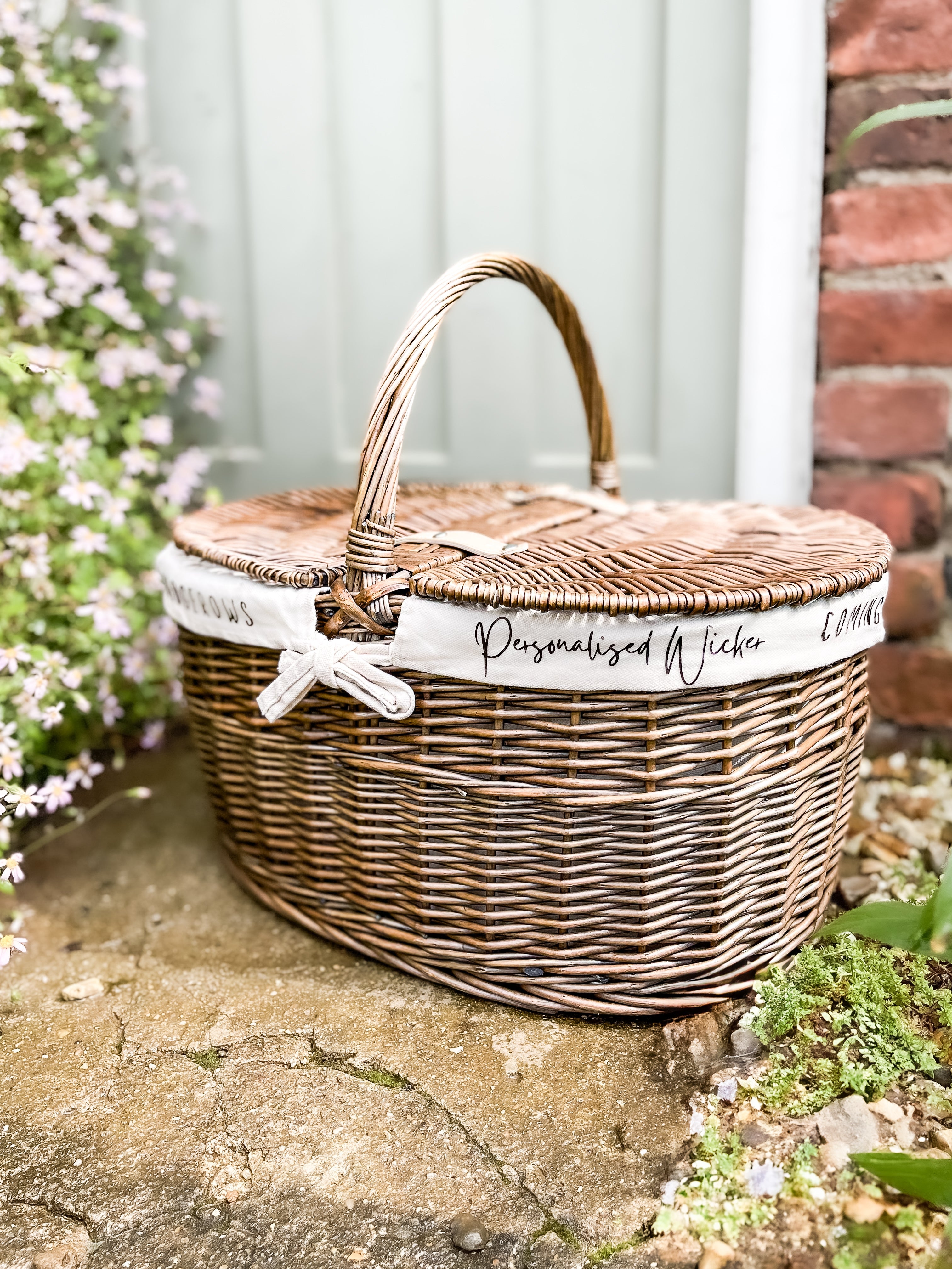 Luxury wicker picnic hampers with personalised cotton lining, perfect for outdoor adventures in the UK.