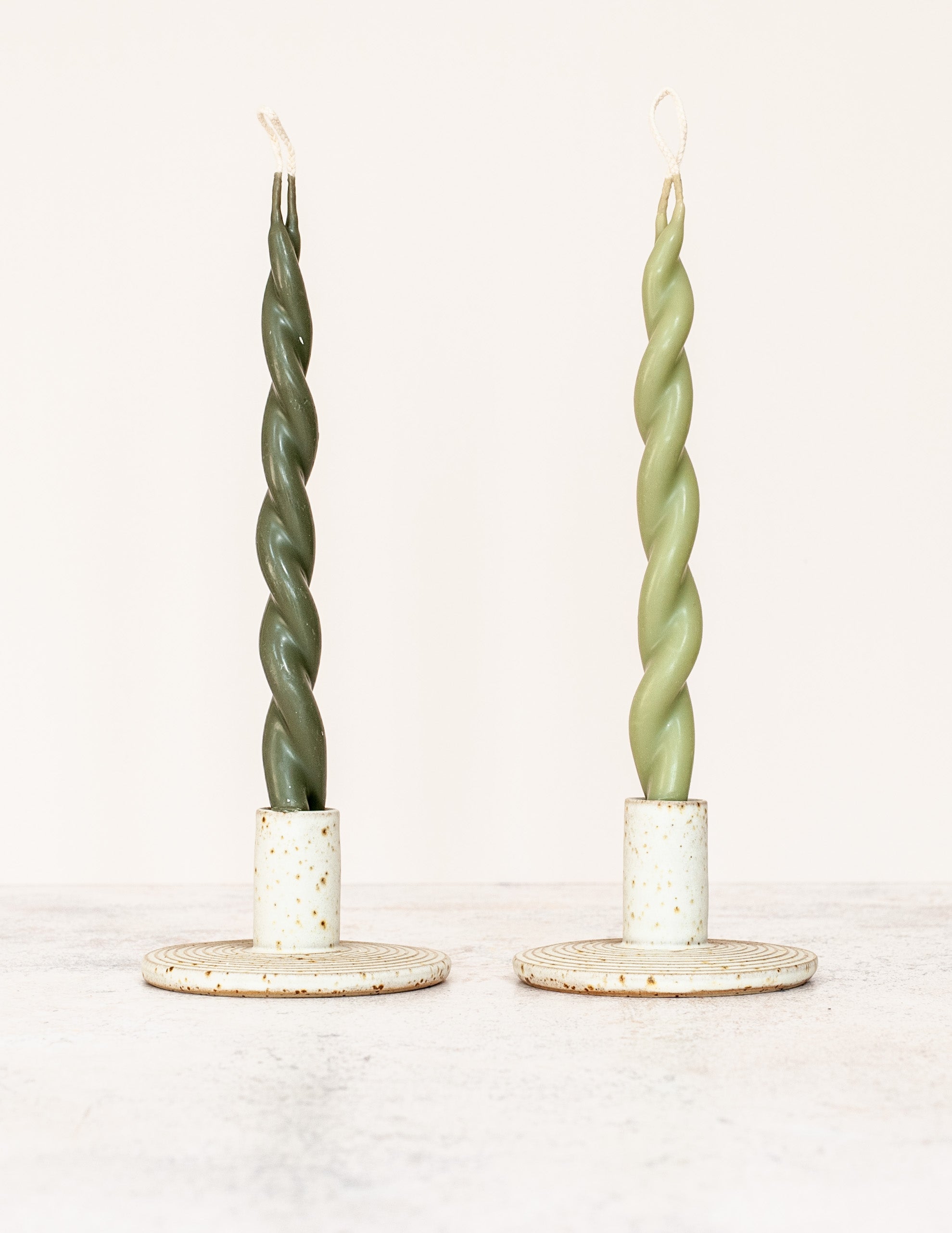 Hand-thrown Bel Holland Ripples Candlestick Holders Set in speckle clay with off-white matt glaze.