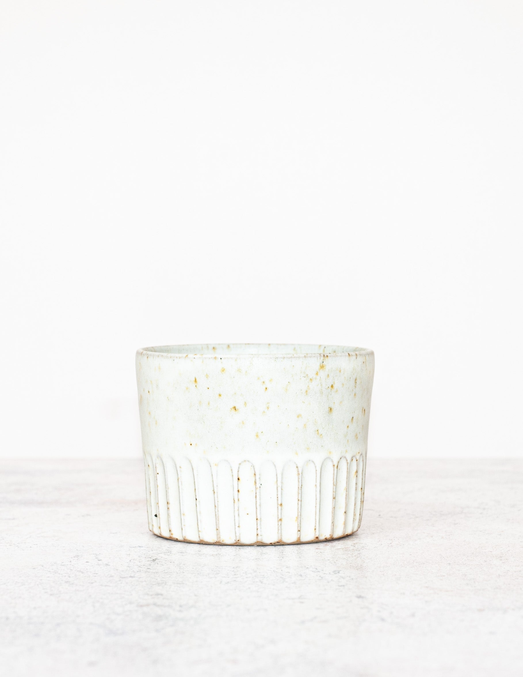 Handthrown carved pottery